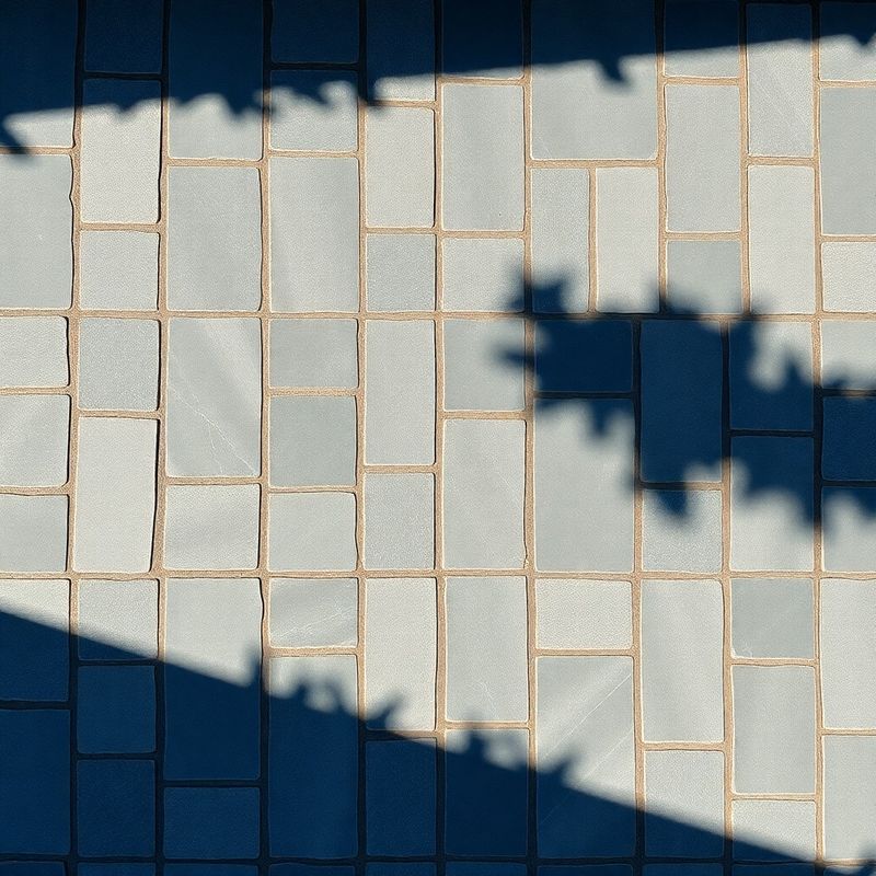 Abstraktna geometrija kamnitega tlaka v azurnih tonih